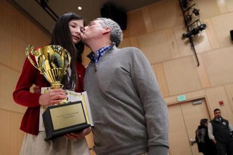 Nicla Marabito, 12, got a kiss from her dad, Joe, after her victory. 
