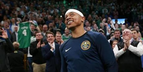 3-18-19: Boston, MA:Former Celtics guard Isaiah Thomas is pictured as his eyes well up a little while he and the fans watch a first quarter video tribute to him on the scoreboard. The Boston Celtics hosted the Denver Nuggets in a regular season NBA basketball game at the TD Garden. (Jim Davis /Globe Staff).
