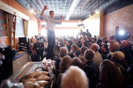 Democratic presidential candidate Beto O'Rourke stood on a countertop as he talked with voters Friday while campaigning for the 2020 nomination at Central Park Coffee Company in Mount Pleasant, Iowa.
