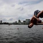 A swimmer took the plunge at a 2015 CitySplash event at the Charles River Esplanade in Boston. 