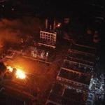An aerial photo released by China?s official news agency showed fires burning at the site of a factory explosion in Yancheng.