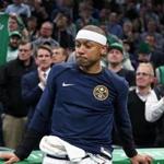3-18-19: Boston, MA:Former Celtics guard Isaiah Thomas is pictured as he gets emotional as the ovation from the fans continued after a first quarter video tribute to him on the scoreboard. The Boston Celtics hosted the Denver Nuggets in a regular season NBA basketball game at the TD Garden. (Jim Davis /Globe Staff).