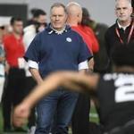 New England Patriot coach Bill Belichick, center, watches Jayson Stanley run a football drill during Georgia Pro Day, Wednesday, March 20, 2019, in Athens, Ga. (AP Photo/John Amis)
