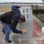 A Department of Conservation and Recreation employee cleaned the memorial on Monday.