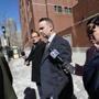 Former trooper Gregory Raftery after he was sentenced in federal court in Boston on Tuesday. 