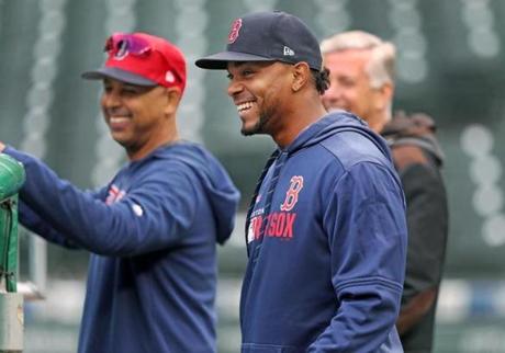 It appears that Xander Bogaerts, shown with manager Alex Cora during a workout Wednesday in Seattle, will be wearing a Red Sox jersey for years to come.
