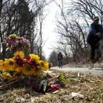 Cyclists rode Saturday past a memorial placed at the site of an accident on the Minuteman Bikeway in Lexington last Sunday.