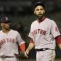 Boston Red Sox pitcher David Price, right, reacts after the final out of the third inning a baseball game against the Oakland Athletics in Oakland, Calif., Monday, April 1, 2019. (AP Photo/Jeff Chiu)