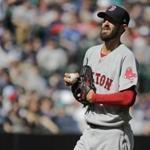 Boston Red Sox starting pitcher Rick Porcello reacts on the mound during a baseball game against the Seattle Mariners, Sunday, March 31, 2019, in Seattle. (AP Photo/Ted S. Warren)