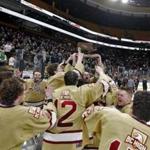 Boston MA 3/17/19 Boston College High players and coaches celebrate their 2-1 victory over Pope Francis High during the fourth overtime period of the MIAA D1A boys' Hockey State Championship at TD Garden. (photo by Matthew J. Lee/Globe staff) topic: reporter: