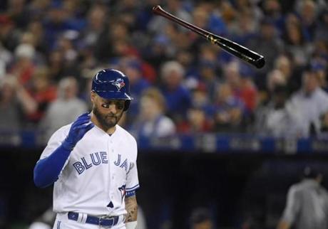 Toronto Blue Jays' Kevin Pillar (11) tosses his bat after striking out during the fifth inning of a baseball game against the Detroit Tigers in Toronto, Thursday, March 28, 2019. (Nathan Denette/The Canadian Press via AP)

