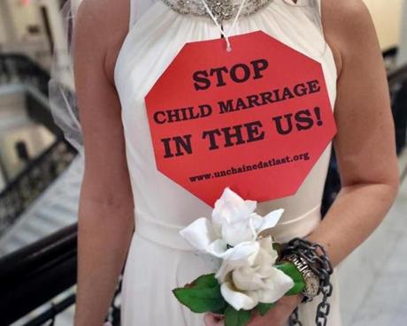 Protesters in bridal gowns at the State House in Boston called for the end of child marriage last month.
