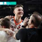 MINNEAPOLIS, MINNESOTA - APRIL 06: Kyle Guy #5 of the Virginia Cavaliers celebrates with teammates after defeating the Auburn Tigers 63-62 during the 2019 NCAA Final Four semifinal at U.S. Bank Stadium on April 6, 2019 in Minneapolis, Minnesota. (Photo by Streeter Lecka/Getty Images)