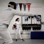  Sophie Yee, 17, waited for her partner during a training session at Bay State Fencers in Somerville on Friday.