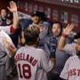 PHOENIX, ARIZONA - APRIL 07: Mitch Moreland #18 of the Boston Red Sox high fives teammates in the dugout after hitting a solo home run against the Arizona Diamondbacks during the seventh inning of the MLB game at Chase Field on April 07, 2019 in Phoenix, Arizona. (Photo by Christian Petersen/Getty Images)