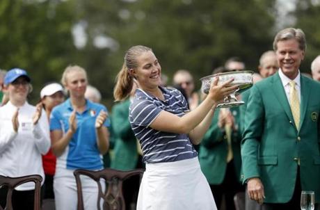Jennifer Kupcho holds the trophy after winning the Augusta National Women's Amateur golf tournament in Augusta, Ga., Saturday, April 6, 2019. (AP Photo/David Goldman)
