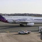 The first direct flight from Logan to Honolulu on Hawaiian Airlines approached the runway on Friday morning. 