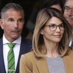 Actress Lori Loughlin and her husband Mossimo Giannulli (left). 
