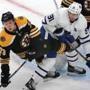 Boston-04/11/2019 Boston Bruins vs Toronto Maple Leafs- Bruins Charlie McAvoy battles with Leafs John Tavares in front of the Bruins net in the 2nd period. Photo by John Tlumacki/Globe Staff(sports)