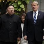 FILE - In this Thursday, Feb. 28, 2019, file photo, President Donald Trump and North Korean leader Kim Jong Un take a walk after their first meeting at the Sofitel Legend Metropole Hanoi hotel, in Hanoi. Kim says he?s open to having a third summit with Trump if the United States could offer mutually-acceptable terms for an agreement by the end of the year. (AP Photo/Evan Vucci, File)