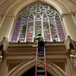 BOSTON, MA - 4/12/2019:Up with the angels is construction worker Nick Martin.Newly renovated Cathedral of the Holy Cross in the South End. The main church will reopen to the public this weekend, just in time for Palm Sunday. (David L Ryan/Globe Staff ) SECTION: METRO TOPIC 13cathedral