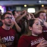 Amherst, MA--04/13/2019--UMass Amherst students watching the Frozen Four championship game at Spoke on Saturday night react to the impeding loss during the last seconds of the game. (Nathan Klima for The Boston Globe) Topic: 14amherst Reporter:
