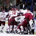 UMass celebrated its overtime win over Denver in the Frozen Four semifinals.