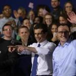 Pete Buttigieg (left) acknowledged attendees with his husband, Chasten Buttigieg, after announcing his presidential candidacy for 2020 during an event on Sunday in South Bend, Indiana. 