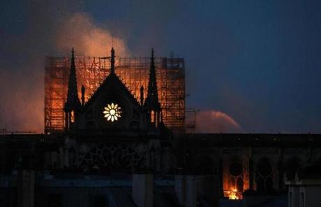 Fire damaged much of the roof and toppled the iconic spire of the cathedral.
