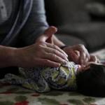ONLY FOR KAY LAZAR STORY Bondsville, MA, 03/17/2019 -- Gayle Suzor takes care of a 15 day-old foster child at her home. (Jessica Rinaldi/Globe Staff) Topic: Reporter: Kay Lazar