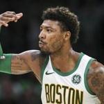 Boston, MA--03/01/2019--Celtics guard Marcus Smart (36) celebrates after hitting a three during the second half of Friday night's game against Washington in TD Garden. (Nathan Klima for The Boston Globe) Topic: Celtics-Wizards Reporter: