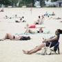 People lay out in the sun on Boston?s Carson Beach in the summer of 2018. 
