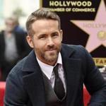 FILE - In this Dec. 15, 2016 file photo, actor Ryan Reynolds poses at a ceremony honoring him with a star on the Hollywood Walk of Fame in Los Angeles. Reynolds has been named Man of the Year by Harvard Universityâ??s Hasty Pudding student theatrical group. The actor who played the title role in 2016â??s â??Deadpoolâ?? will be roasted by the student group before being getting his pudding pot on Feb. 3. (Photo by Chris Pizzello/Invision/AP, File)