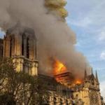 This photo taken on Monday April 15, 2019 shows Notre Dame cathedral burning in Paris. Firefighters declared success Tuesday April 16, 2019 morning in an over 12-hour battle to extinguish an inferno engulfing Paris' iconic Notre Dame cathedral that claimed its spire and roof, but spared its bell towers. (AP Photo/Vanessa Pena)