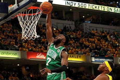 Indiannapolis, IN - 4/19/2019 - (1st quarter) Boston Celtics guard Jaylen Brown (7) dunks over Indiana Pacers center Myles Turner (33) during the first quarter. The Indiana Pacers host the Boston Celtics in Game 3 of Round 1 of the Eastern Conference Playoffs at Bankers Life Field House. - (Barry Chin/Globe Staff), Section: Sports, Reporter: Adam Himmelsbach, Topic: 20Celtics-Pacers, LOID: 8.5.1024795915.
