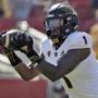 FILE - In this Oct. 27, 2018, file photo, Arizona State wide receiver N'Keal Harry makes a touchdown catch against Southern California during the first half of an NCAA college football game in Los Angeles. Harry announced Monday, Nov. 26, 2018, he will skip his senior season to enter the NFL draft. (AP Photo/Marcio Jose Sanchez, File)