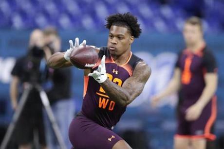 Arizona State wide receiver N'Keal Harry runs a drill at the NFL football scouting combine in Indianapolis, Saturday, March 2, 2019. (AP Photo/Michael Conroy)
