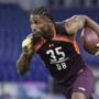 Vanderbilt defensive back Joejuan Williams runs a drill at the NFL football scouting combine in Indianapolis, Monday, March 4, 2019. (AP Photo/Michael Conroy)