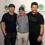 Donnie, Paul, and Mark Wahlberg at a Wahlburgers opening.